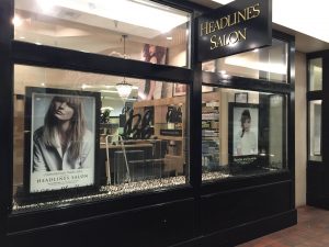 Blade Signs custom storefront outdoor vinyl window projecting sign 300x225